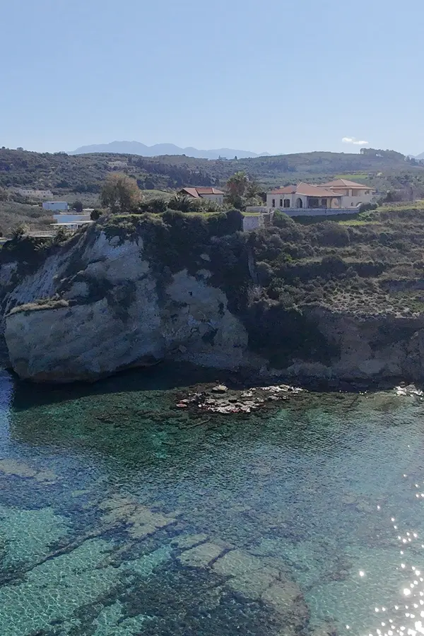 White sandy stretch and crystalline turquoise waters at Kera beach, a popular coastal destination in Crete.